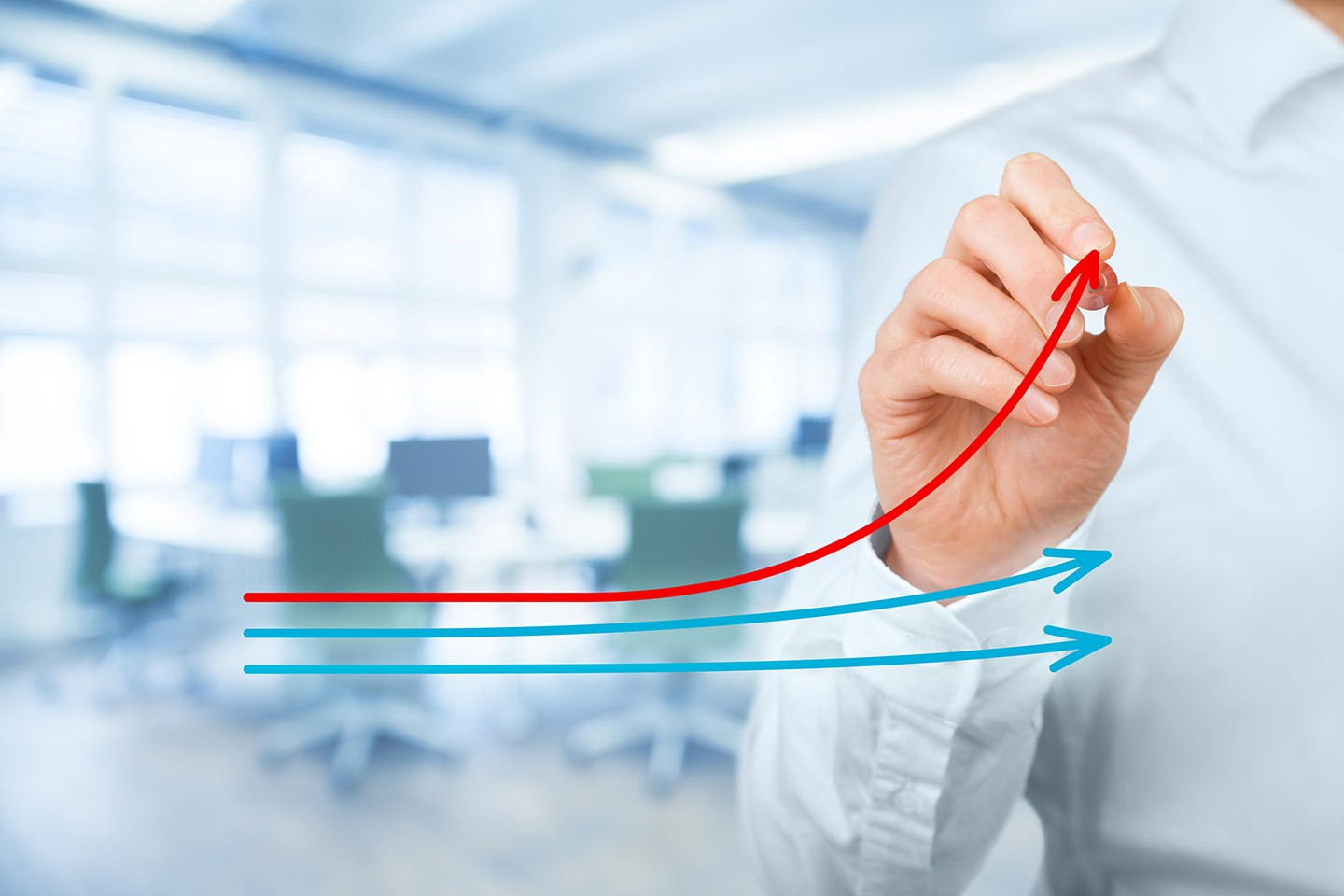 Office Worker Draws Line Graph Depicting Greater Increase